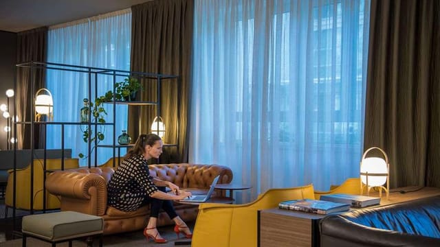 Pirelli meeting lounge, modern seating, event networking