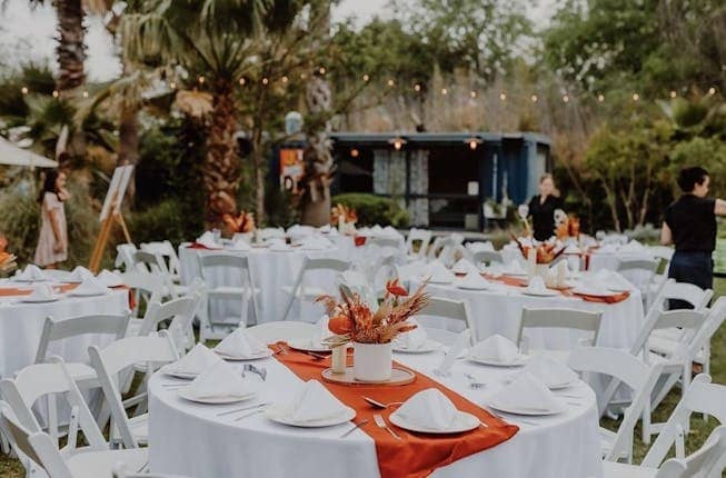 Ivy Hall outdoor reception, burnt orange tables, wedding event
