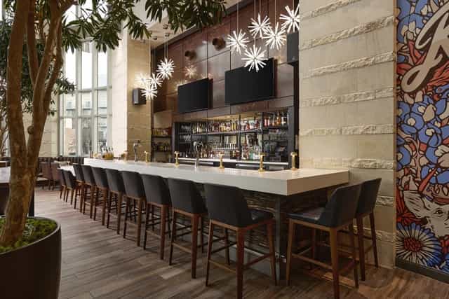 Archer Hotel Austin bar, modern lighting, cocktail reception, networking event