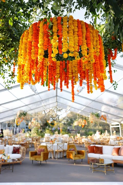 Marigold floral tent decor, wedding event.