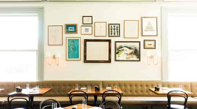 Elegant dining event space, gallery wall, banquette, private dinner, cocktail party