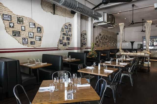 Industrial gastropub event space, brick, booths, corporate party, networking
