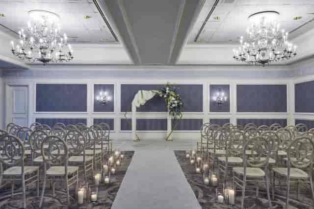 Austin wedding ballroom floral arch romantic ceremony