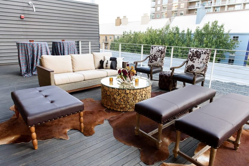 Brazos Hall lounge, cowhide seating, cocktail reception, networking event