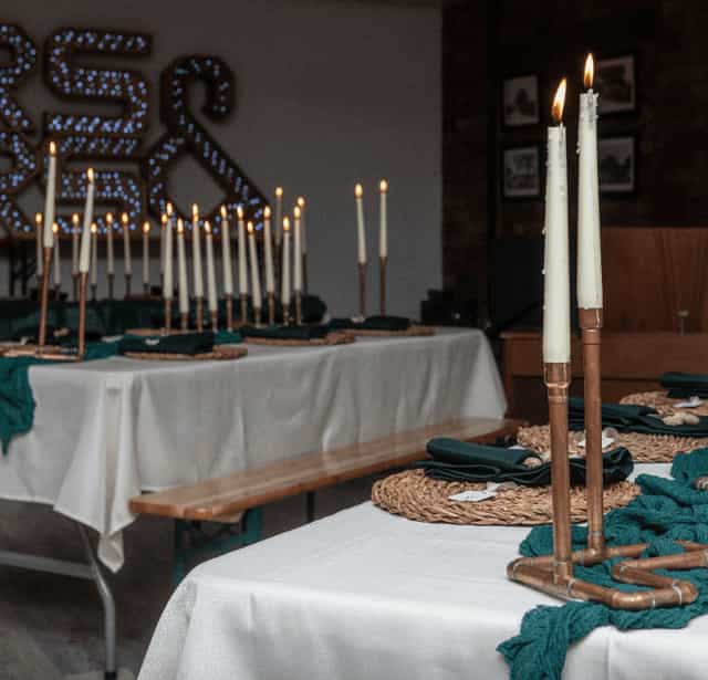 Candlelit banquet, elegant rustic event, private dining, wedding reception