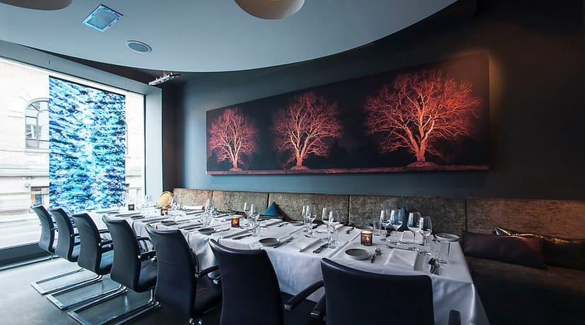 Eik Restaurant private dining event, formal table, modern art