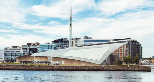Modern conference venue, glass waterfront, gala event, Oslo museum