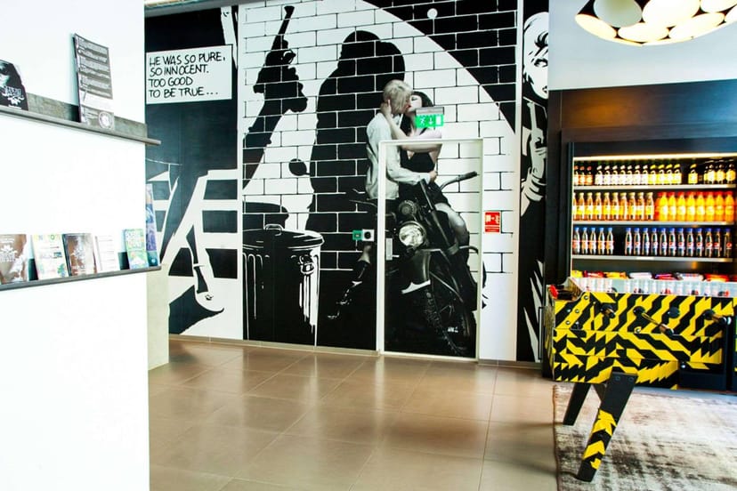 Urban hotel lobby, bold mural, brand launch, networking event