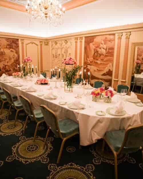 Elegant dining table with floral centerpieces at Hotel Bristol for weddings and receptions.