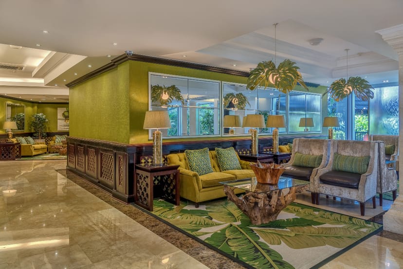 Sea Cliff Hotel lobby, tropical decor, conference networking