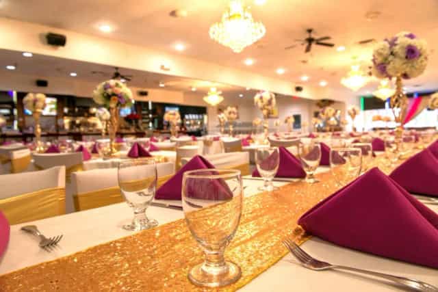 Indian Restaurant banquet hall, gold purple decor, event reception