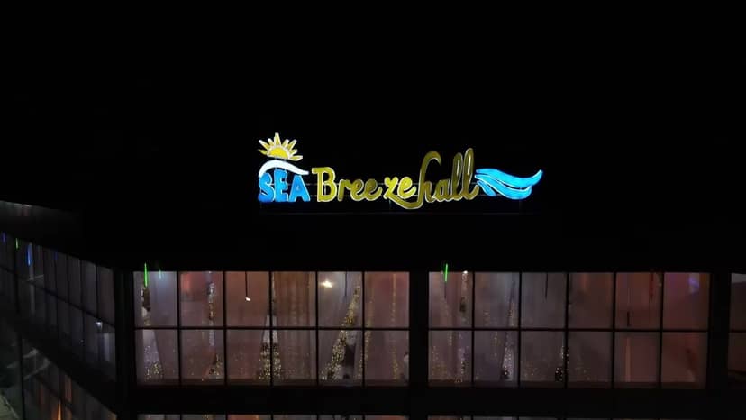 Sea Breeze Hall Ukumbi: Night event venue, modern signage