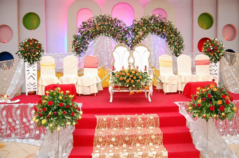 Ukumbi wedding reception, red carpet, floral decor