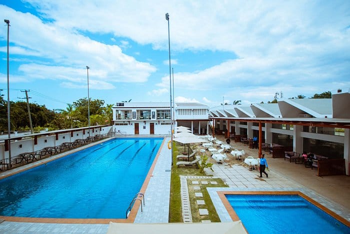Oasis Village poolside event hall, covered dining, corporate retreat