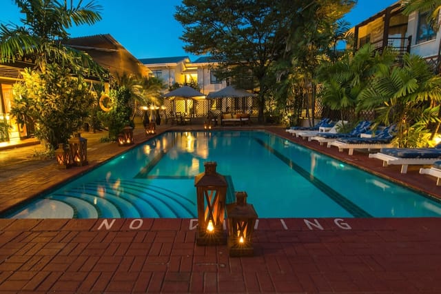 Protea Hotel Dar outdoor bar, pool, reception, networking.