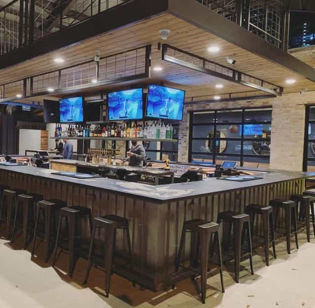 Live music bar, corporate event, networking mixer, industrial venue
