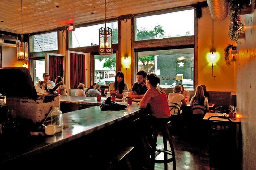 Chic restaurant bar, intimate event venue, corporate mixer