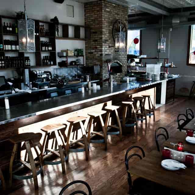 Stylish restaurant bar, brick, wine, cocktail, networking event