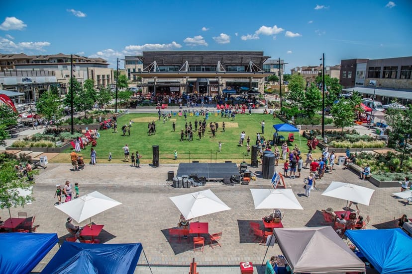 Hill Country Galleria outdoor event stage umbrellas festival
