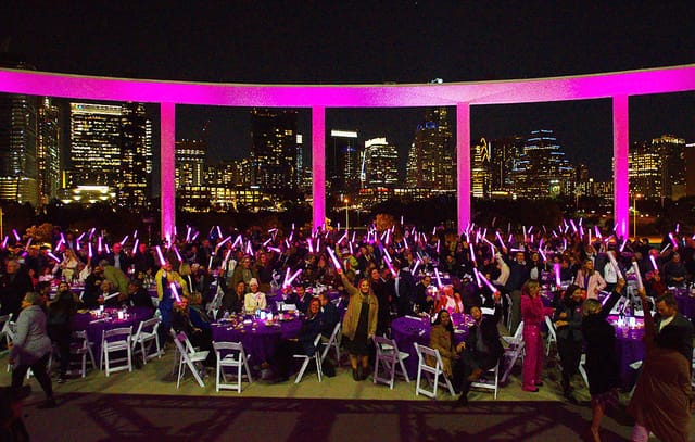 Gala NYC skyline, purple decor, live event