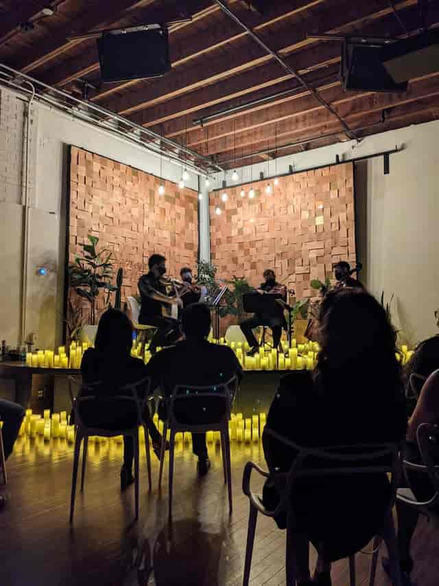 Intimate concert, candlelit venue, luxury event