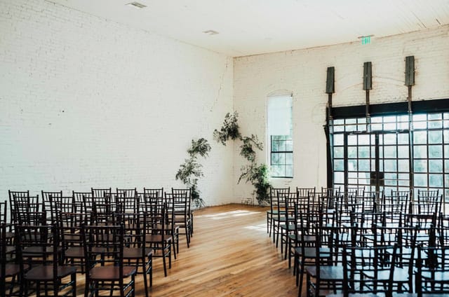 Industrial event space with natural light for ceremonies