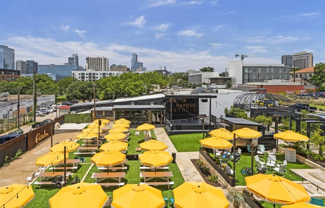 IYKYK Inn Cahoots outdoor event, seating, modern backdrop, corporate, networking