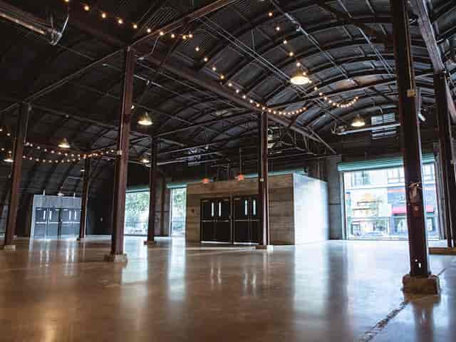 Raw event space, flexible industrial venue, modern creative lighting