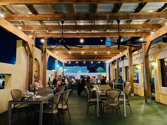 Rao's Bakery patio party room: outdoor seating, ceiling fans, event reception