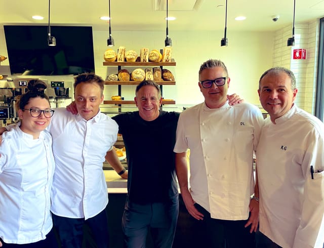 Osteria Fiorella private dining team posing after culinary event.