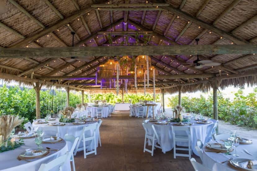 Palm House wedding pavilion, tropical event, beach ceremony.