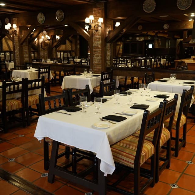 Casa Juancho intimate event dining, brick beams