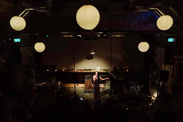 Solo concert at The Grounds, intimate venue, product launch event
