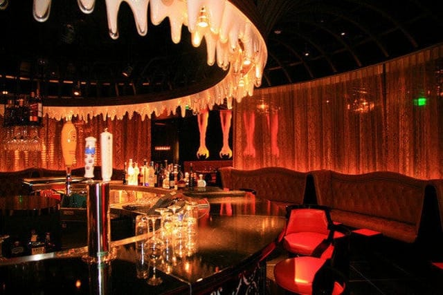 Jean-Georges Steakhouse bar, plush seating, cocktail reception, upscale lounge