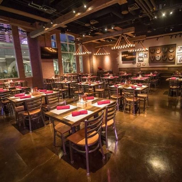 Rodeo Room event space, modern, warm lighting, corporate, rehearsal dinner