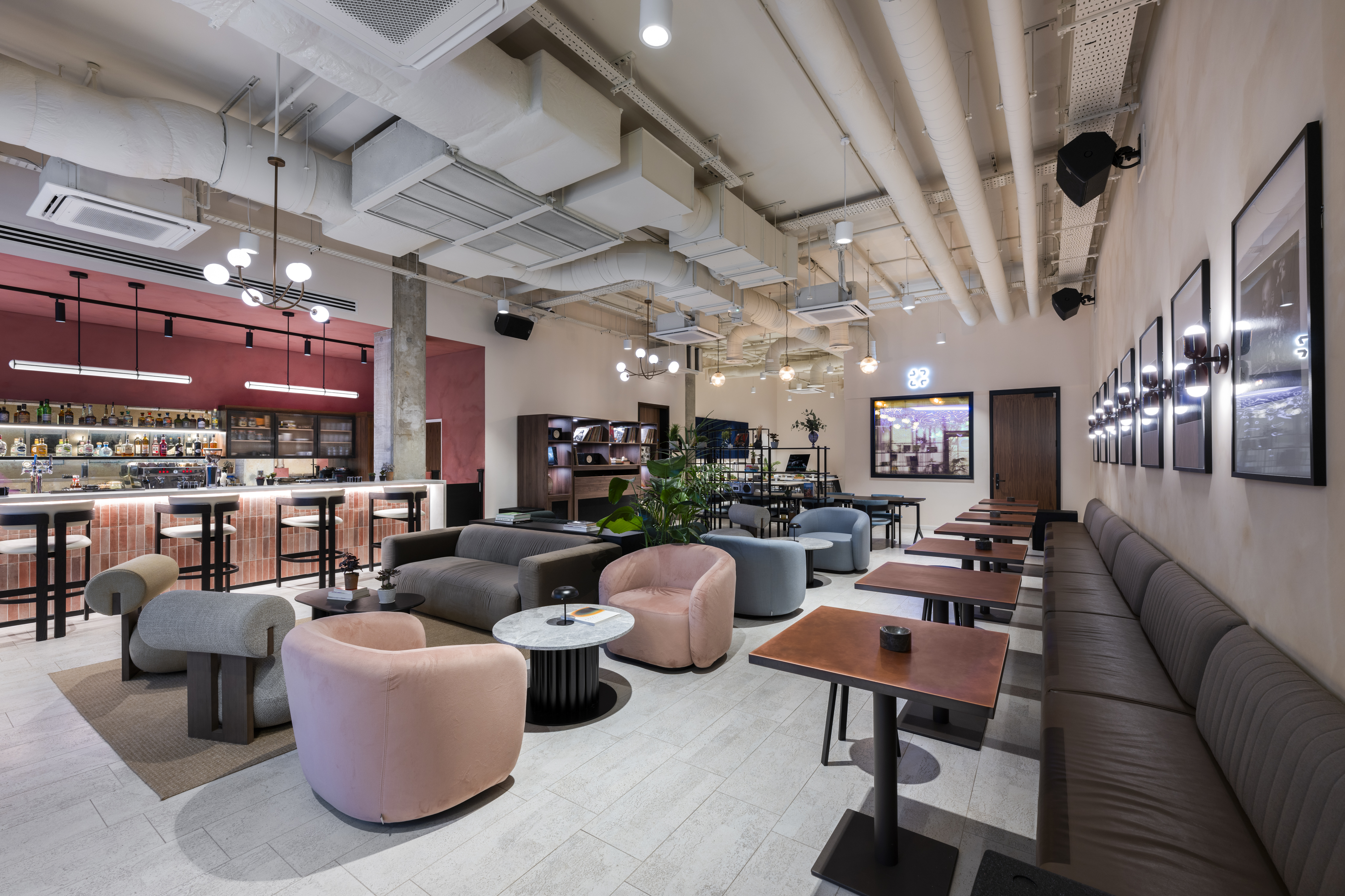 Modern event space at Qube Elephant Lounge & Bar with stylish seating for meetings. - Banner