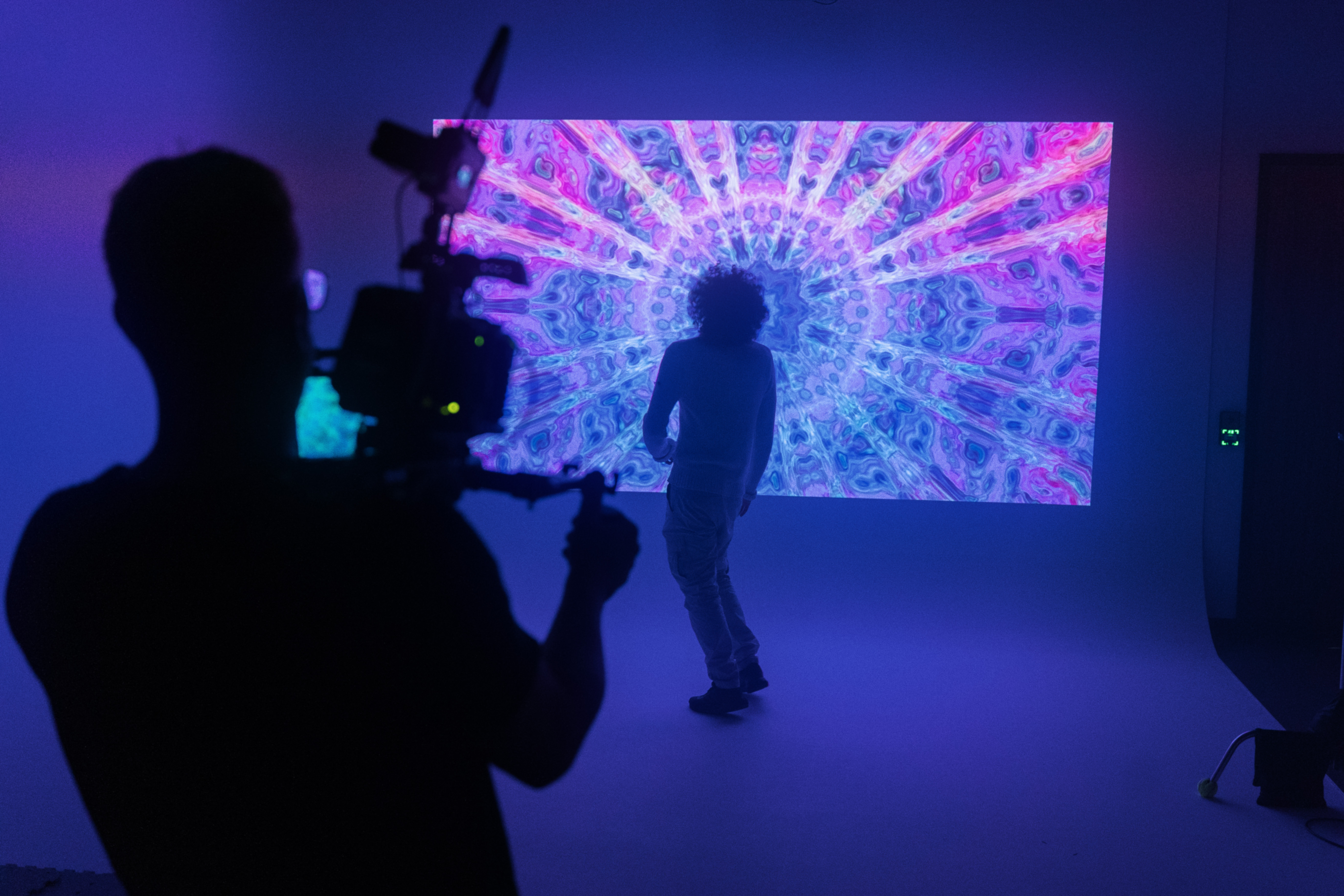 The Frame at Qube Elephant Lounge, vibrant backdrop for virtual events and performances. - Banner