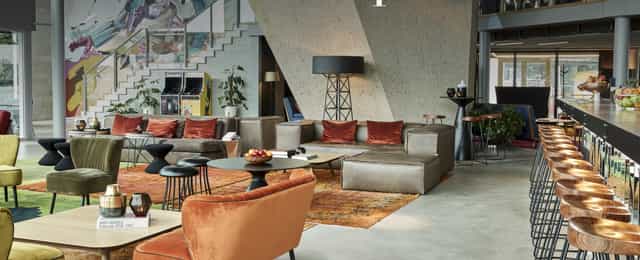Sir Adam Hotel modern lounge, networking event venue.