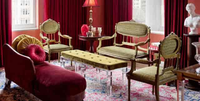 First Lady Suites lounge in DC, vintage furniture, ideal for networking events.