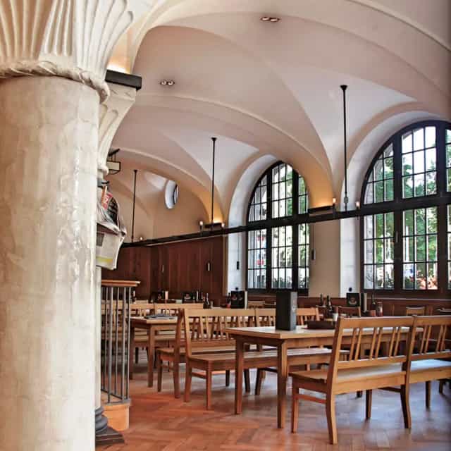Historic Paulaner Brauhaus event venue, arched windows, corporate dinner, networking
