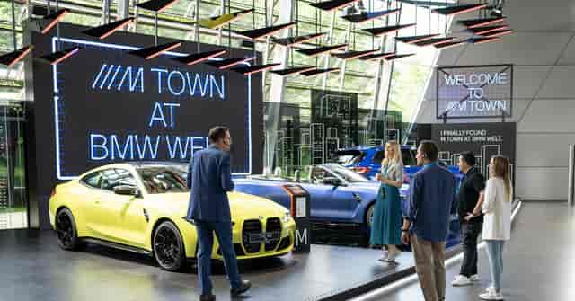 BMW Welt launch event, sleek digital signage, modern product display