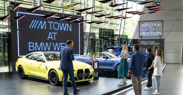 BMW Welt launch event, sleek digital signage, modern product display