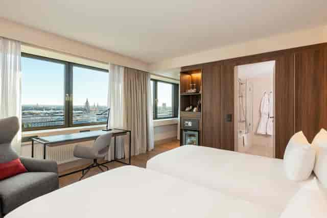 Munich hotel room, twin beds, city view, corporate retreat, VIP lodging