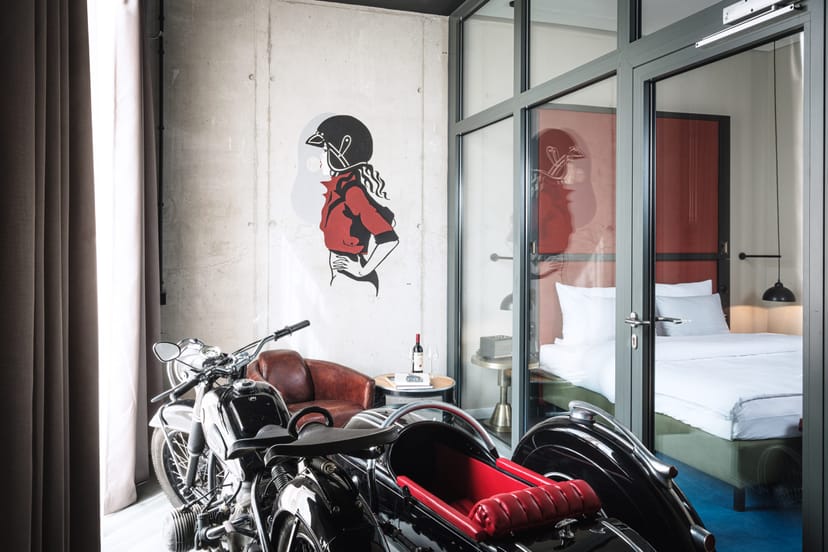 Boutique hotel room with motorcycle, AMERON München Motorworld event