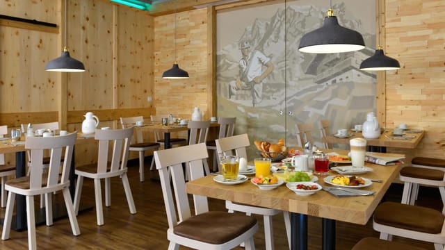 Rustic Zirbenstube hotel retreat, wood mountain mural, corporate event meeting