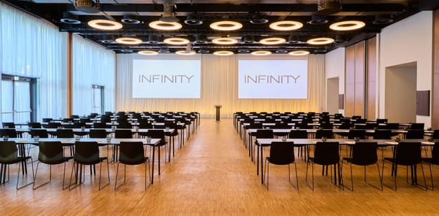 Munich conference ballroom with screens