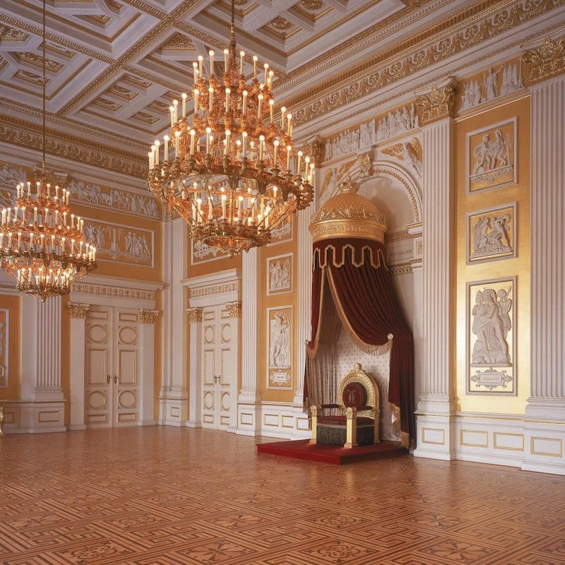 Munich ballroom gala venue, opulent chandeliers, throne