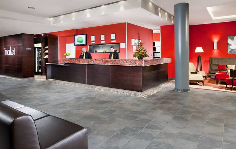Munich hotel lobby, red wall, event reception