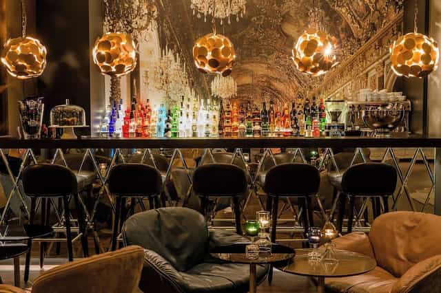 Motel One Munich bar lounge, chandelier, cocktail event