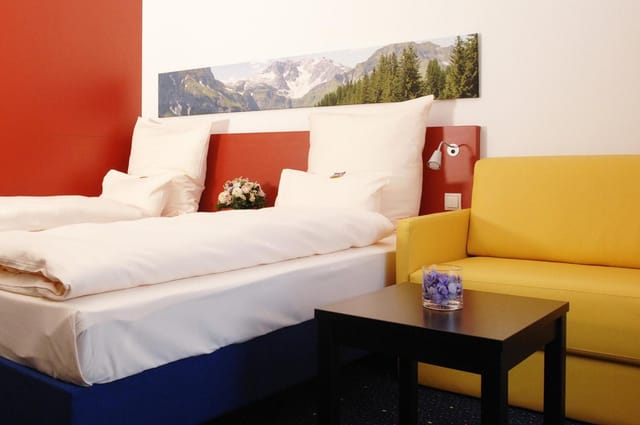 Munich hotel suite, modern seating, corporate retreat, executive stay